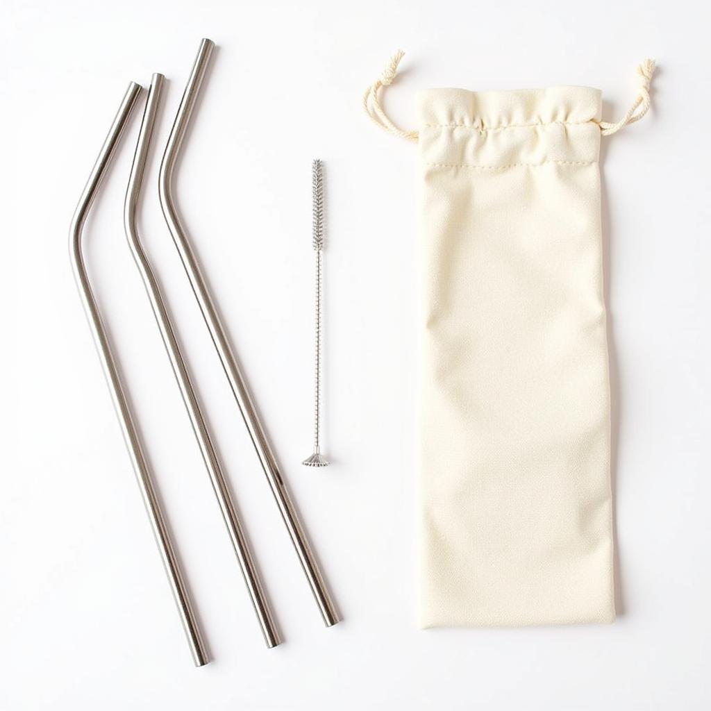 A set of metal smoothie straws with cleaning brush and carrying pouch.