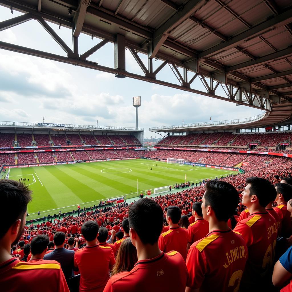 Fans wearing ties cheering for "Đội Bóng Đá"