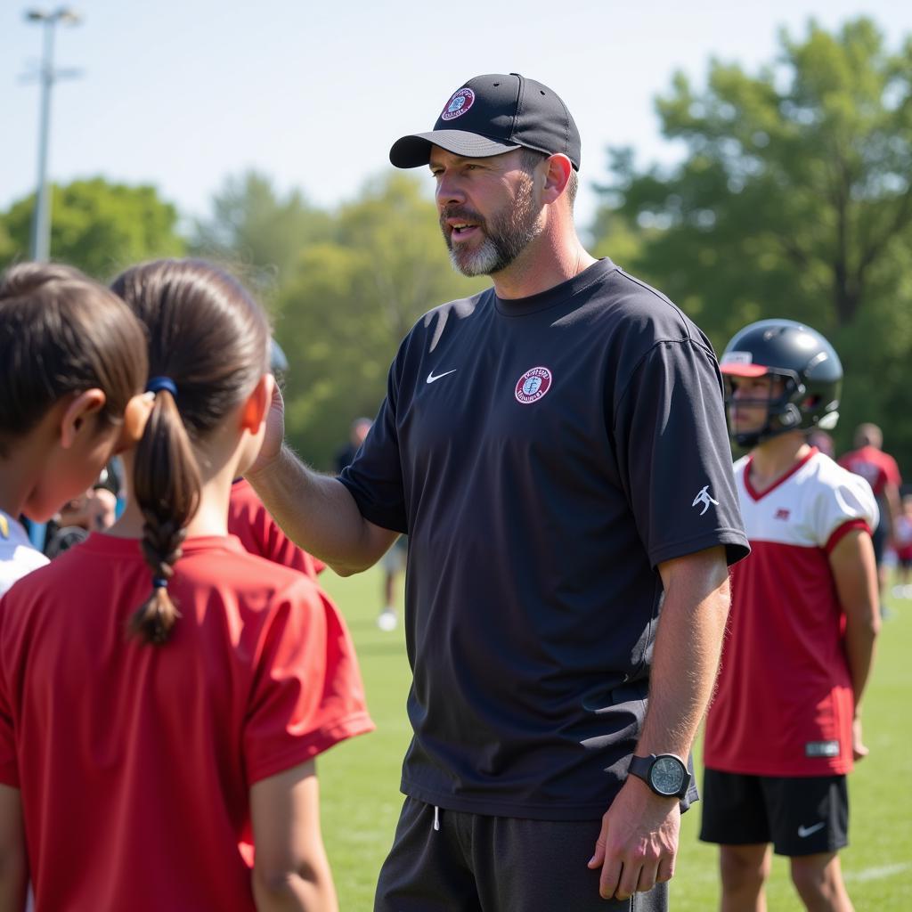 Dave Walsh coaching young players