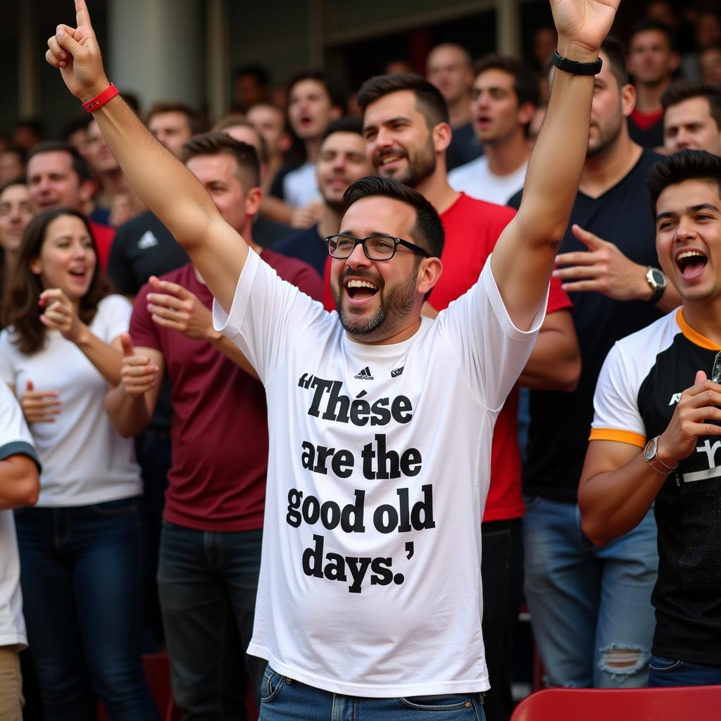 Fan wearing "These Are The Good Old Days" shirt at a match.