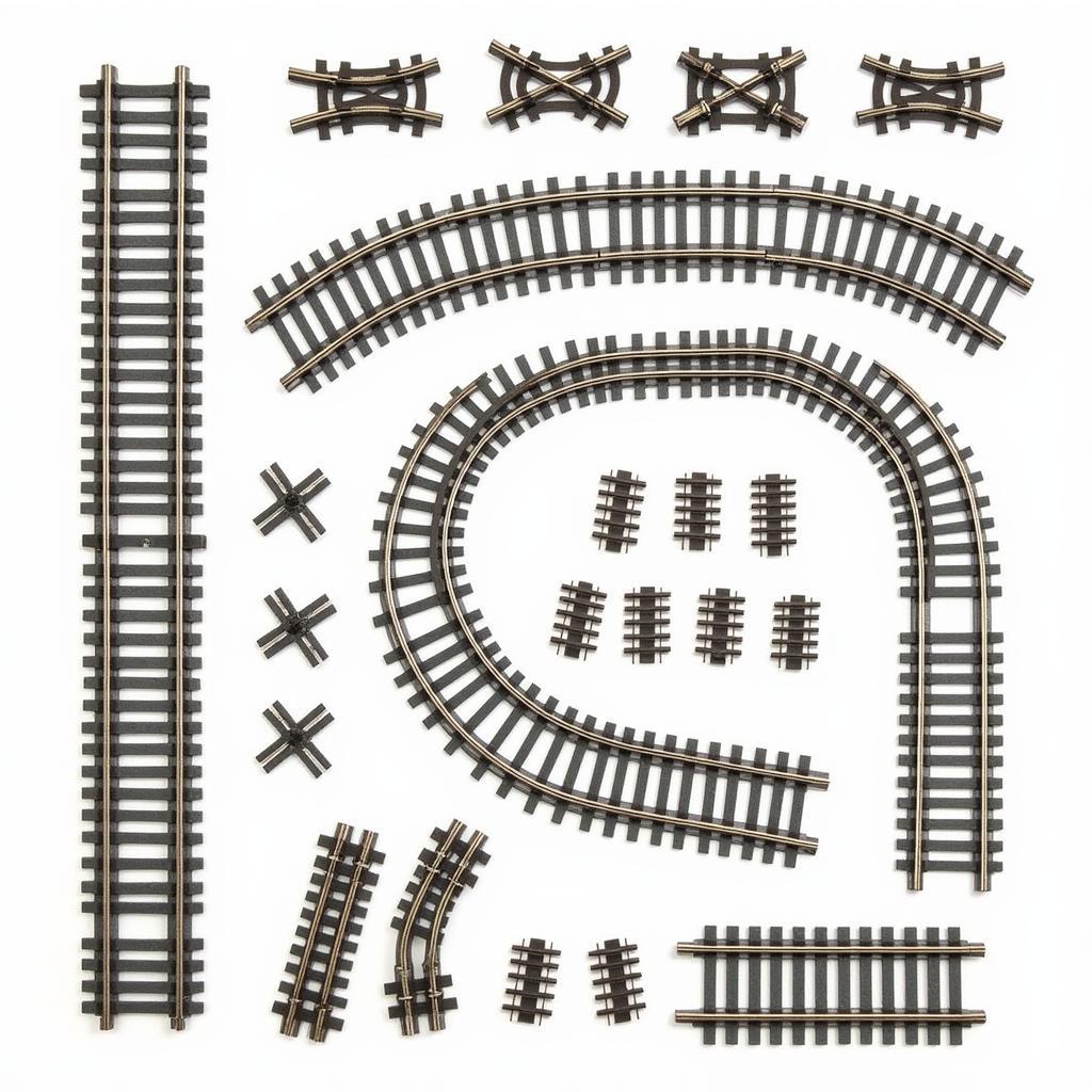 Different types of RC train tracks: straight, curved, and turnouts