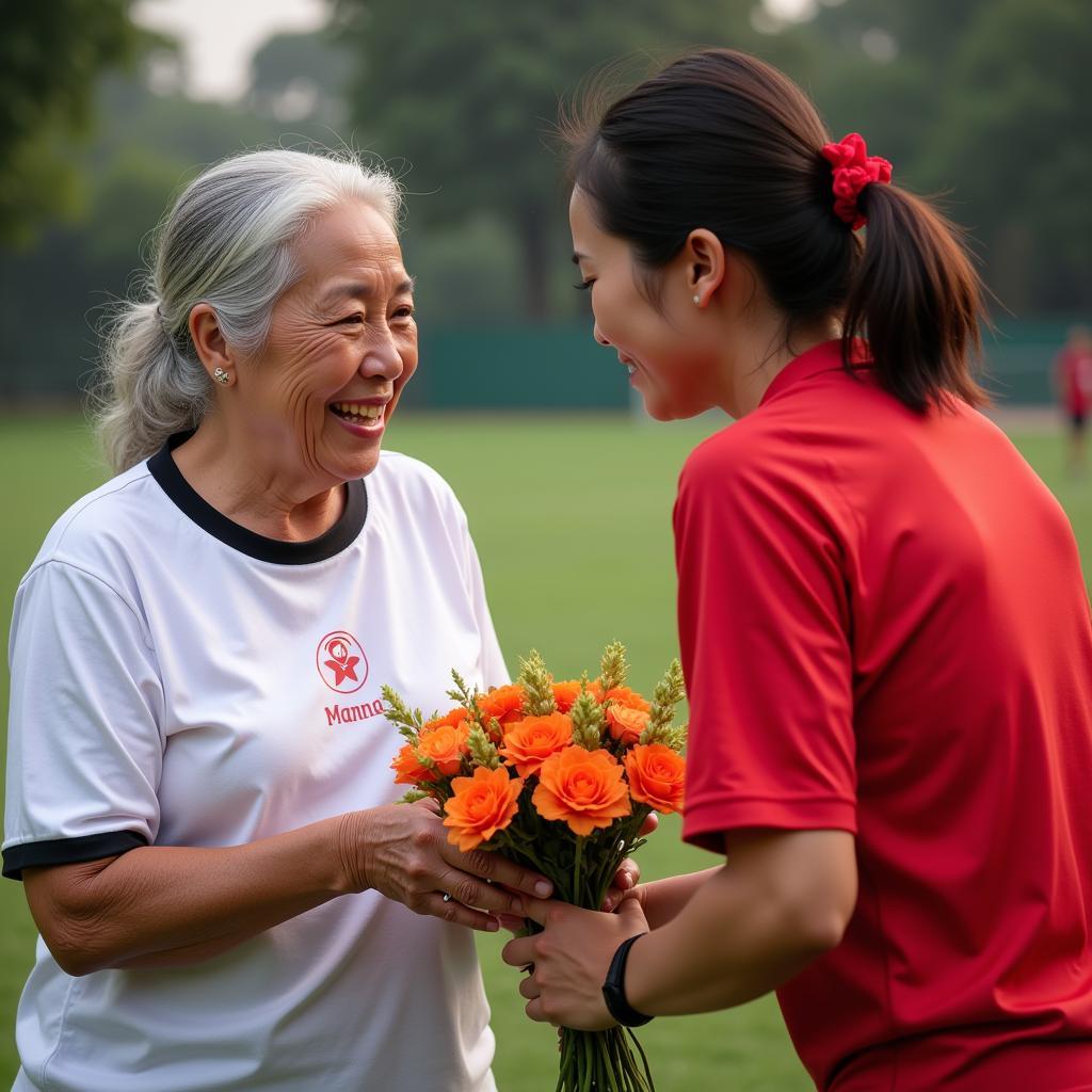 Senior Mum nhận hoa từ Đội Bóng Đá